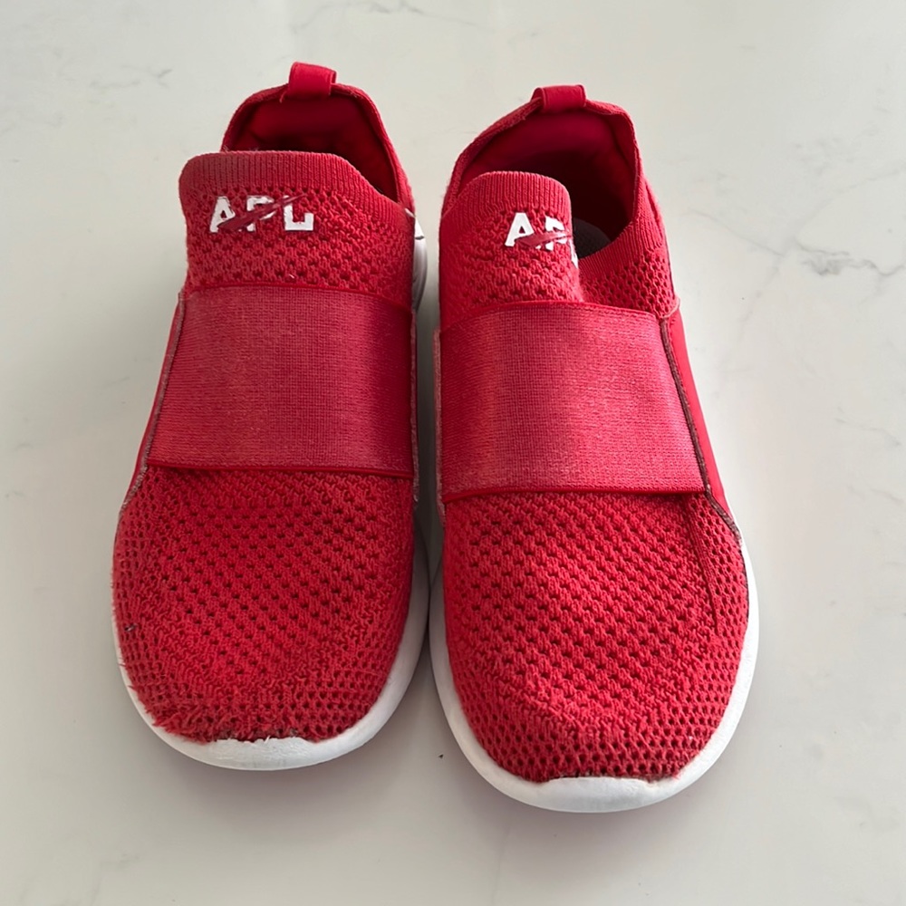 Red APL slip on